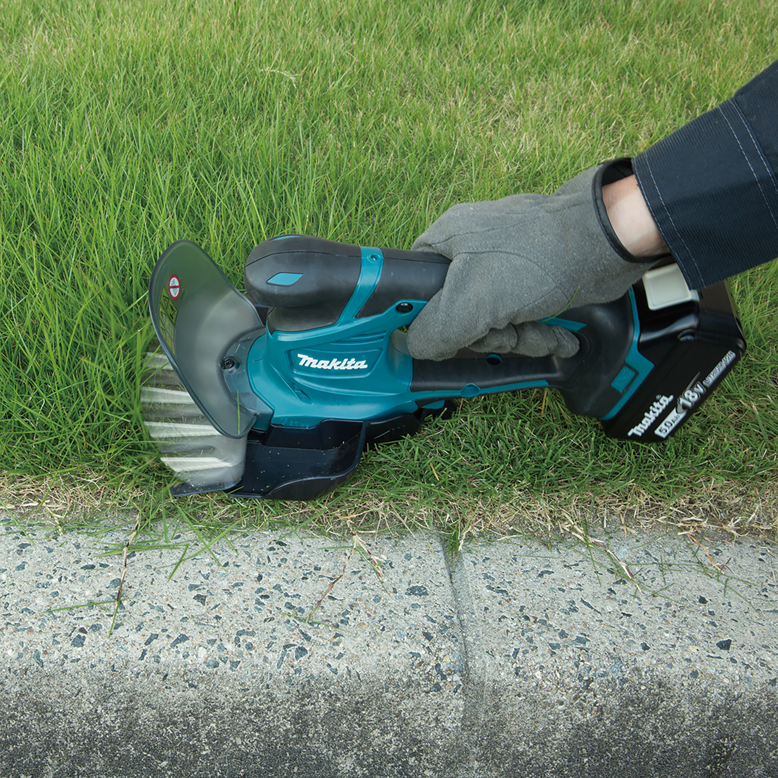 MAKITA DUM604ZX 18V accu-gras- en heggenschaar 16cm/20cm (zonder
